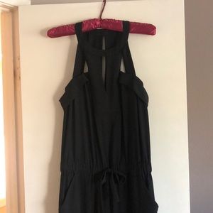 Black jumpsuit with cutouts at top